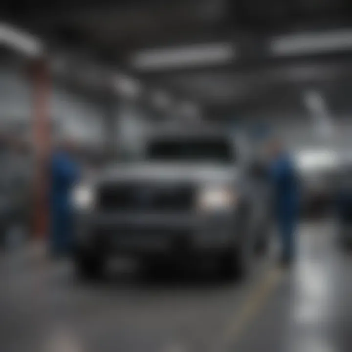 Service center at Earnhardt Ford with technicians working on vehicles