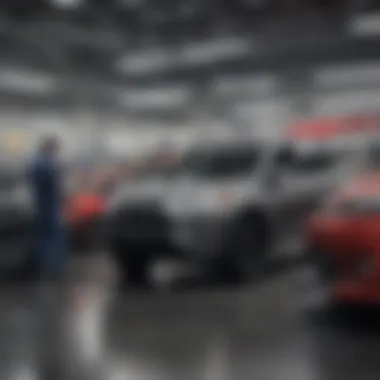 Service department with technicians working on vehicles